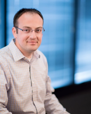 smiling person in professional attire
